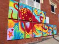 Photo from the official unveiling of the gorgeous “Octopus Garden” mural installed at the corner of Main and Brown Streets.