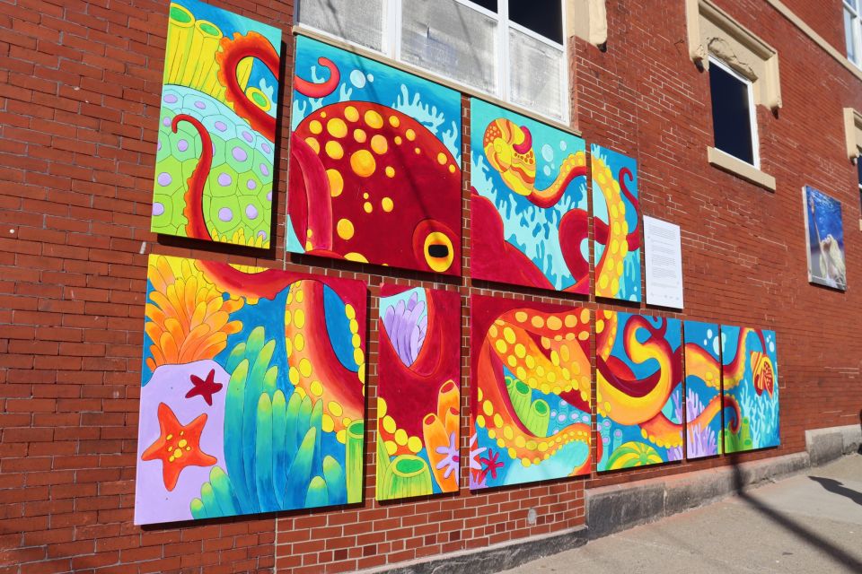 Photo from the official unveiling of the gorgeous “Octopus Garden” mural installed at the corner of Main and Brown Streets.